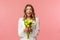 Holidays, beauty and spring concept. Portrait of excited and amazed young beautiful blond girl in white dress, holding