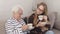 Holidays with family. Mother and daughter or granny and granddaughter having the tea together