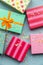 Holidays giftboxes on the pastel mint background