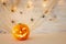 Holidays halloween concept image. Pumpkin, spiders over wooden table