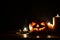 Holidays image of halloween. Pumpkins over wooden table dark background