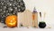 holidays image of Halloween. spiders, pumpkin and wooden board frame for text or mock up over table