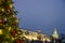 Holidays in Moscow. In the square a Christmas tree glows, decorated with balls and beautiful Christmas toys close-up.