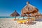 Holidays under parasol on Caribbean beach