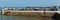 Holidays and visitors on the harbour wall Swanage waiting for boat trips panorama