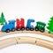 Holidays, winter and celebration concept - Christmas composition Russian wooden letters train cars the word New Year on wood railw