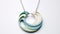 Hollow Circle Necklace With Green And Turquoise Blue Wave Design