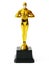 Hollywood Golden Oscar Academy award statue in medical mask. Success and victory concept. Oscar ceremony in coronavirus time