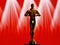 Hollywood Golden Oscar Academy award statue on red background with light rays. Success and victory concept.