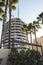 HOLLYWOOD, LOS ANGELES, UNITED STATES - Apr 06, 2018: Low angle view of Capitol Records\\\' Yucca Street entrance, framed by palm