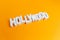 Hollywood wooden words in a orange background