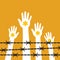 Holocaust Remembrance Day. Human hands with a yellow star of David behind barbed wire.