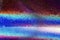 Holographic glitter texture. Rainbow spectrum gradient. Shiny abstract background.