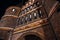 Holstentor in Luebeck at night, detail of the medieval city gate