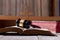 Holy bible book and judges gavel on table background. Judicial system, constitution, democracy, rule of law. There are no people