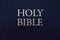 Holy Bible title closeup. Religion and faith concept. Religious literature. Bible isolated.