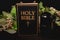 Holy bible and urn with ashes