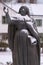 Holy Bridget bronze monument snow covered, Vadstena, Sweden