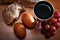 Holy Communion and Easter concept with The Holy Bible. Bread, eggs, grapes and a silver chalice of red wine