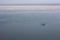 Holy Ganga river with a small boat in Varanasi