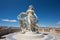 Holy goddess of love antique monumental statue, a beautiful woman, white marble, cinematic, blue sky background. AI