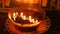 Holy images of saint people inside of Saint Petka Church, Sofia, candles burning