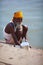 Holy man brahman washing by the river in india