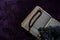 A Holy Quran, Prayer beads and turbans on the purple Prayer rug. Eid mubarak or islamic concept