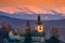 Holy Spirit church in Sielnica village with Low Tatras mountains on horizont during winter evening