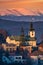 Holy Spirit church in Sielnica village with Low Tatras mountains on horizont during winter sunset