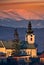 Holy Spirit church in Sielnica village with Low Tatras mountains on horizont during winter sunset