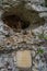 Holy stone statue in the Brother Klaus grotto at Beuron Monastery in the Danube Valley in autumn