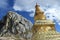 Holy stupa and mountains