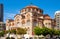 Holy Trinity Cathedral orthodox church - Agia Triada - in Piraeus port city in port quarter at Saronic Gulf of Aegean sea in broad