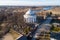 Holy Trinity Church in Suderve, Vilnius district, Lithuania. Cemetery in foreground. Drone