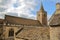 Holy Trinity Church with traditional stone roofs in the foreground, Bradford on Avon, UK