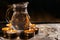 Holy water is heated by candles on a pedestal in a church for the rite of christening of a child