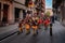 Holy week in Spain adults and kids with Roman soldiers armors walking