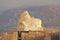 Holy white stone cow in sunrise Hampi, Matanga hill. The figure