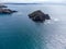 Holywell bay aerial drone. Islands known as gull or carters rocks cornwall england uk