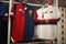 Home and away shirt of Genoa 1893 football team on sale in Genoa Shop at Genoa `Porto Antico` area, Italy.