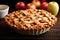 home baked apple pie with lattice crust on cooling rack