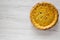 Home-baked Canadian Tourtiere Meat Pie on a white wooden background, top view. Flat lay, overhead, from above. Copy space