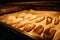 Home baking pies with fillings in the oven.