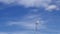 Home based single spike Telecommunications antenna tower light clouds day time lapse