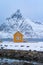 Home, cabin or house, Norwegian fishing village in Reine City, Lofoten islands, Nordland county, Norway, Europe. White snowy