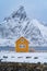 Home, cabin or house, Norwegian fishing village in Reine City, Lofoten islands, Nordland county, Norway, Europe. White snowy