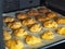 Home cooking. Halloween. Pumpkin cookies with raisins and seasonings in the home kitchen oven