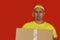 Home delivery food. Donation box of food for people suffering from coronavirus pandemic consequences, man in a yellow t-shirt on