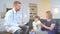 Home doctor came to sick boy and his mother. he examines a child and records readings in notebook